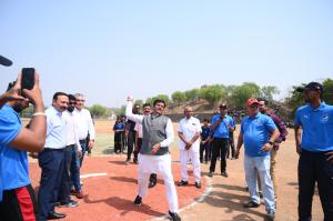 Shri Bharat Singh Kushwah throws ceremonial first pitch