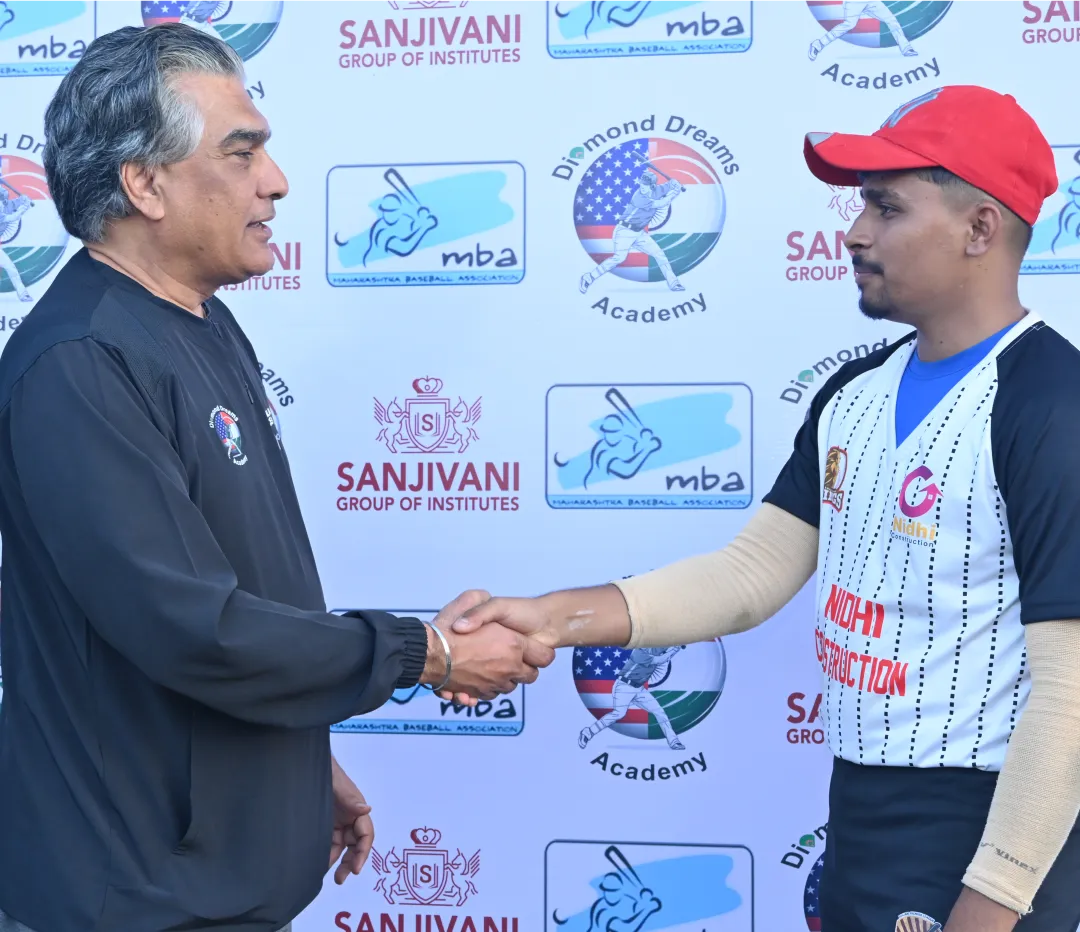 Kanwal Sra, CEO DDA with a DDA Player at a DDA Camp